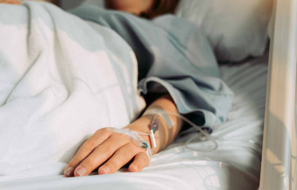 A person receiving IV treatment