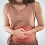 Woman suffering from colitis