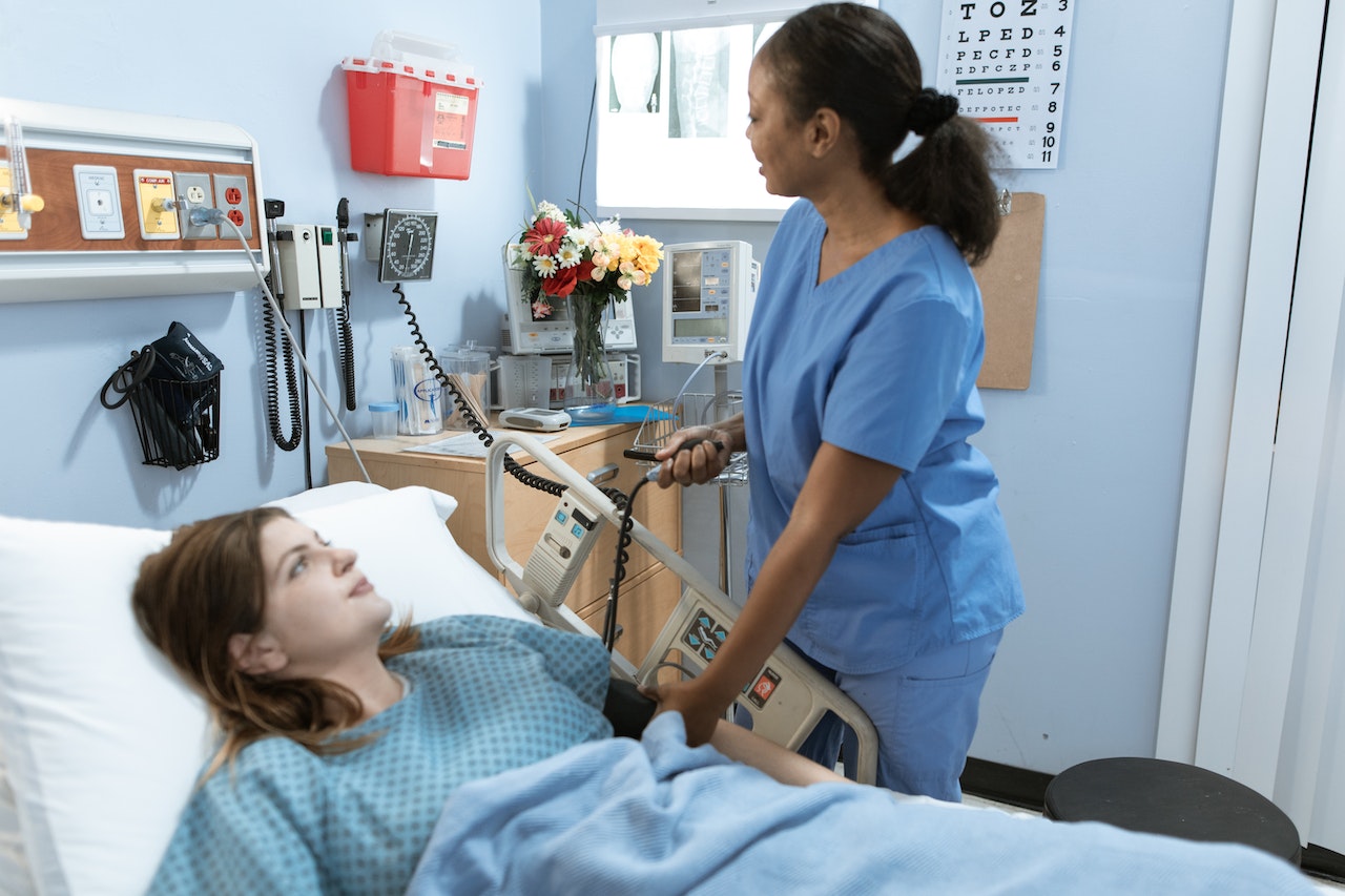 Nurse taking a patient’s blood pressure
