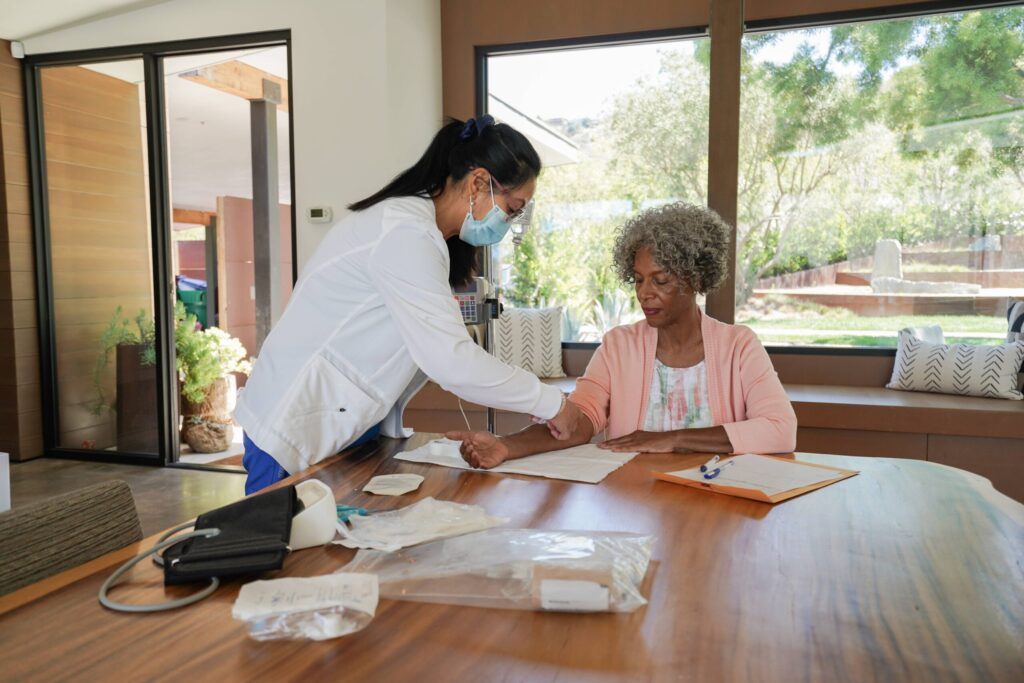 A nurse administering IVIG to a patient