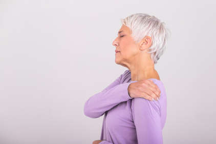 Senior woman with joint pain as a result of Bavencio side effects