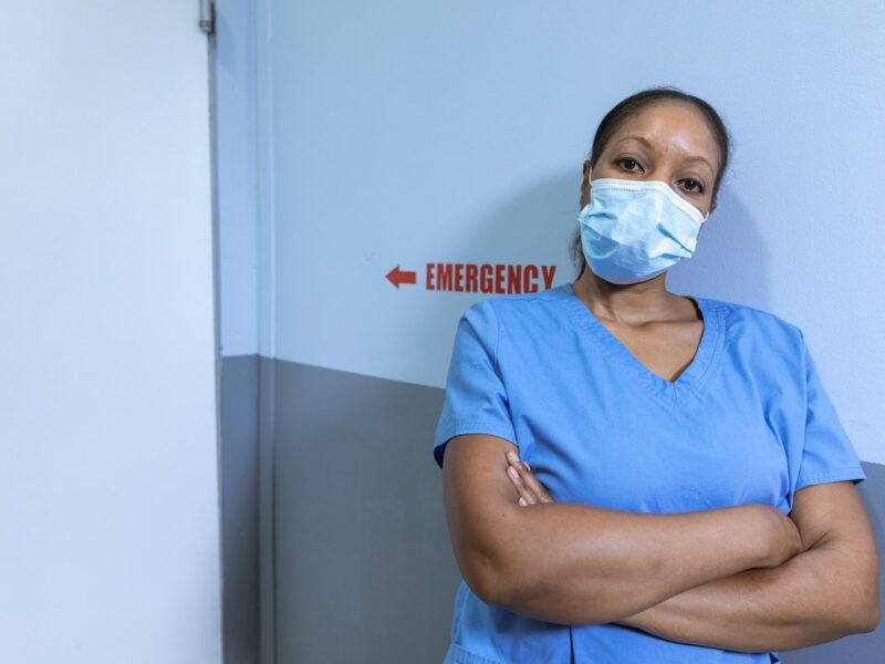Female nurse in blue scrubs