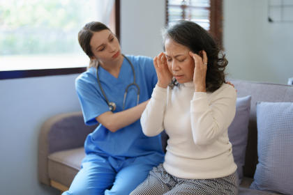 Nurse with a Bivigam patient suffering from side effects