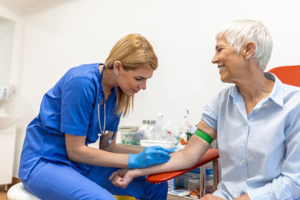 Doctor preparing to draw blood for a blood test