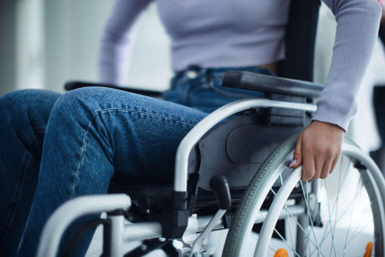 Patient with multiple sclerosis in a wheelchair