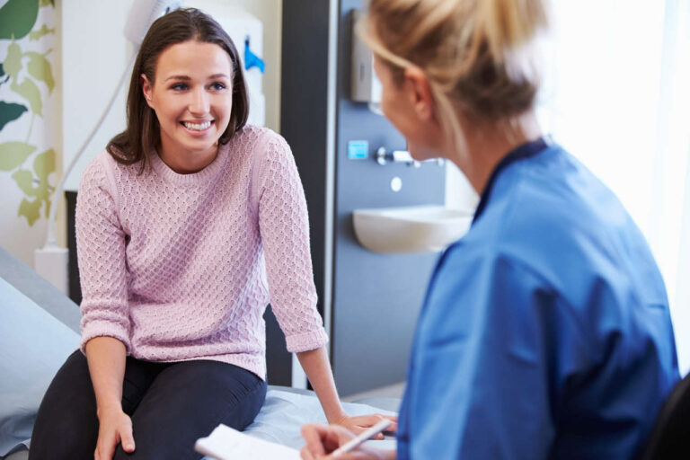 Woman consulting with doctor about hemophilia