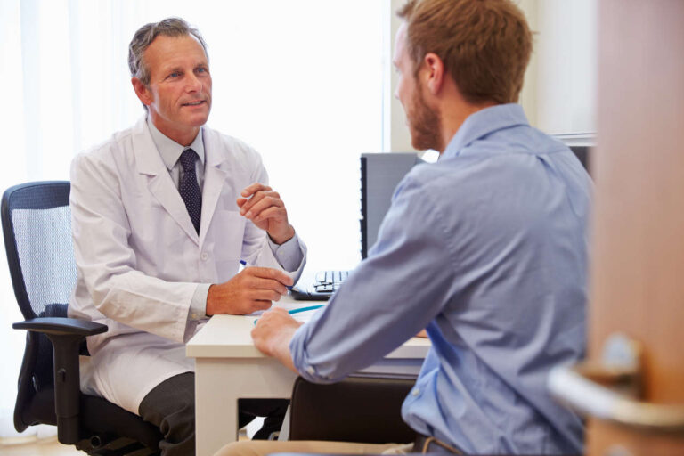 Male patient having consultation with doctor about Udenyca