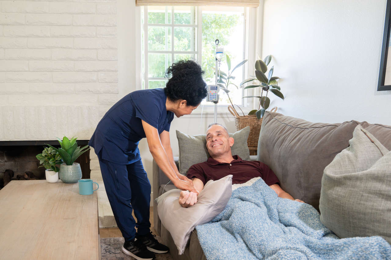 Man receiving IG therapy at home