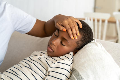 Boy suffering from nausea after taking FEIBA