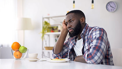 Man experiencing loss of appetite from taking Jevtana