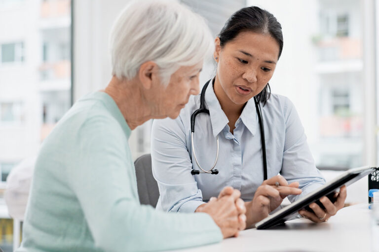 Doctor consulting with patient about Xeljanz