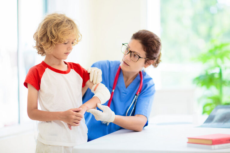 Kogenate FS patient with a nurse fixing a bandage