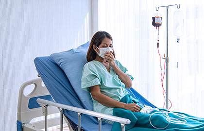 Patient receiving a blood transfusion in a hospital