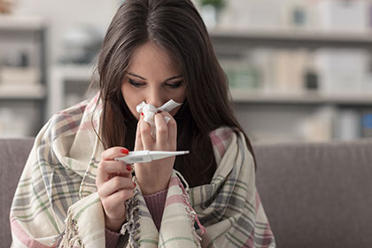 Woman with fever as a symptom of TSS