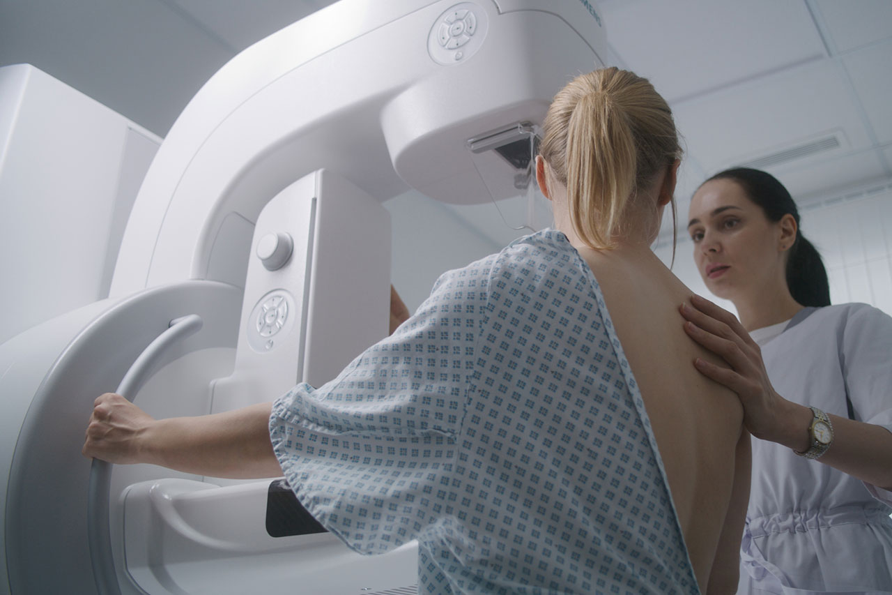 Woman receiving screening for breast cancer, a condition that can be treated with Enhertu