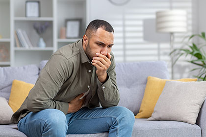 Patient experiencing nausea, a side effect of ifosfaminde