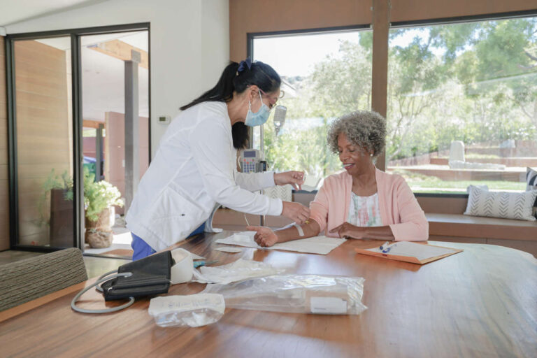 Nurse preparing patient for IVIG for Parvovirus B19-Induced Pure Red Cell Aplasia