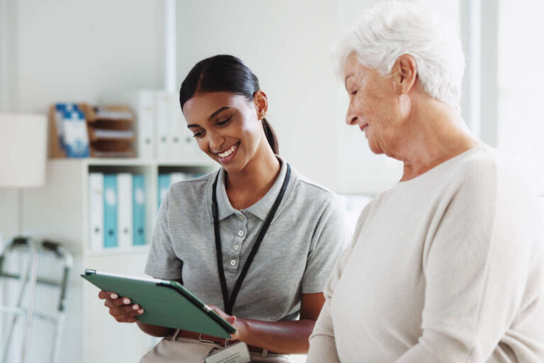 Healthcare professional discussing Medicare and TPN with patient