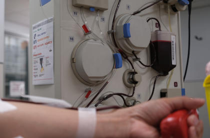 Arm of an individual giving a plasma donation for plasmapheresis