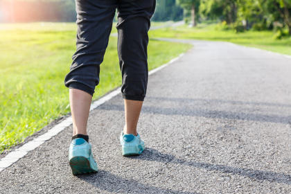 A woman walking in the park for exercise
