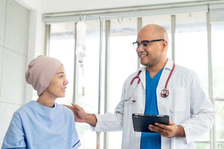 Doctor discussing cancer and weight loss with a patient