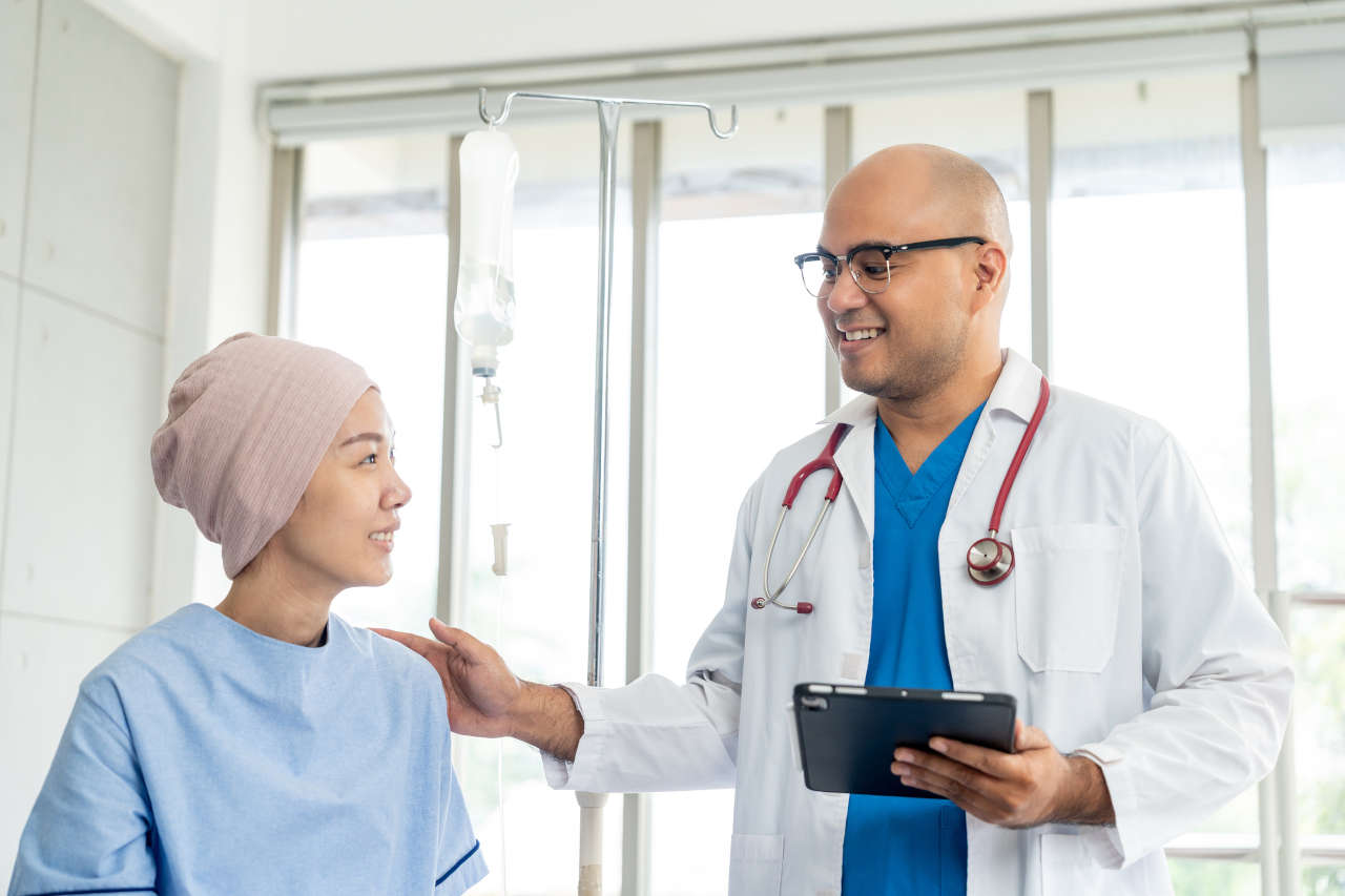 Doctor discussing cancer and weight loss with a patient